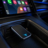 Adaptador Autolink en la consola del coche con CarPlay en pantalla